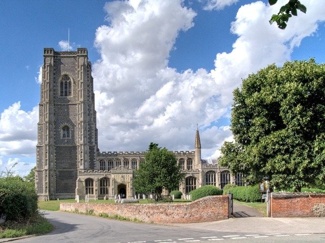 The Church of St Peter and St Paul at Lavenham, its tower built on the Spring wool money: the town Charlotte Channell's villages ring, and where the tree's humblest English line and its grandest stand within sight of the same stones. Image: Geograph via Wikimedia Commons, CC BY-SA 2.0